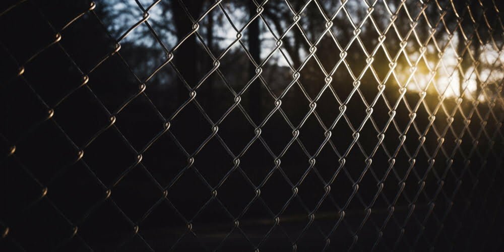 chain-link-fence-with-sun