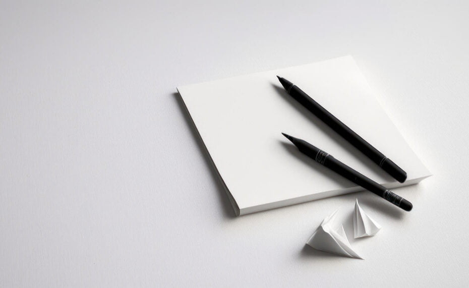 empty-white-sheet-paper-with-pens-table-background-blank-mockup