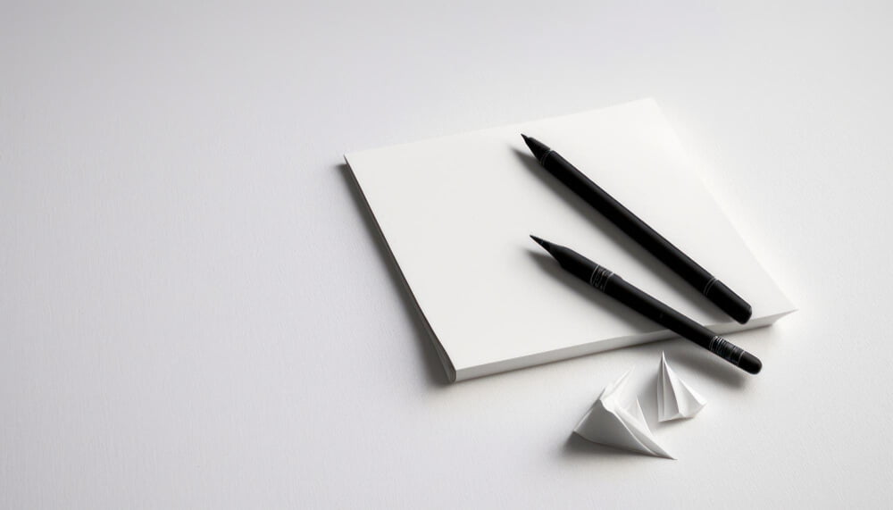 empty-white-sheet-paper-with-pens-table-background-blank-mockup