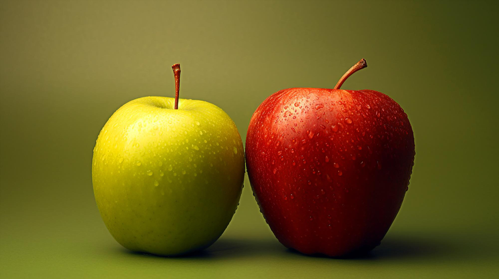 green-apple-red-apple-are-sitting-side-by-side-green-background